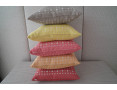Colored cushions with little flowers decoration