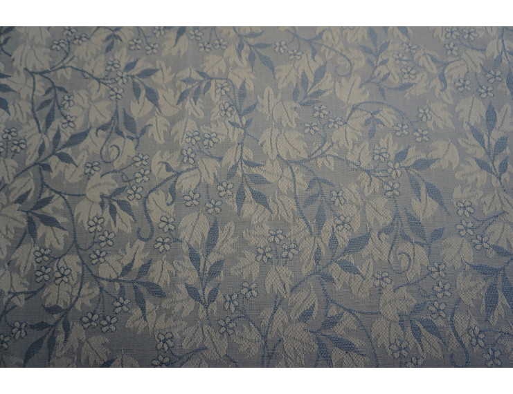 Jacquard fabric in mixed cotton and linen with blue leaves