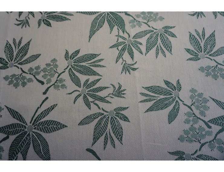 Jacquard fabric in mixed cotton and linen with green leaves