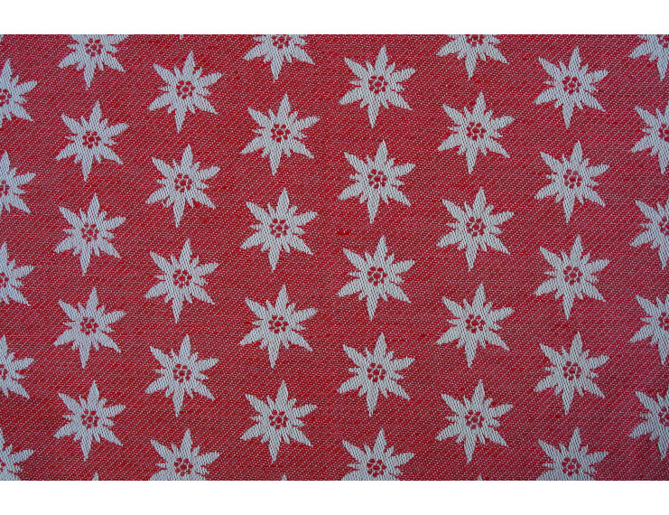 Tessuto jacquard rosso in misto cotone e lino con edelweiss