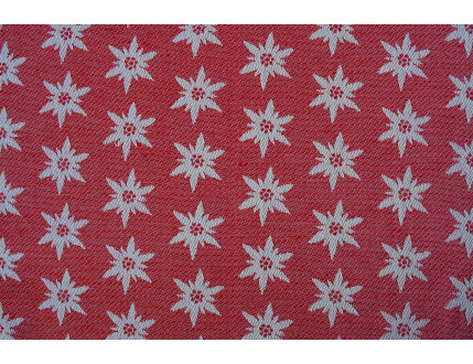 Pezzo di stoffa campione gratuito rosso con stella alpina