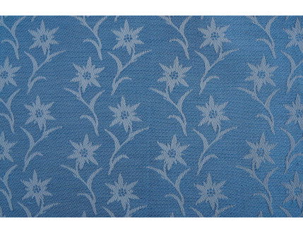 Tessuto jacquard celeste in misto cotone e lino con edelweiss