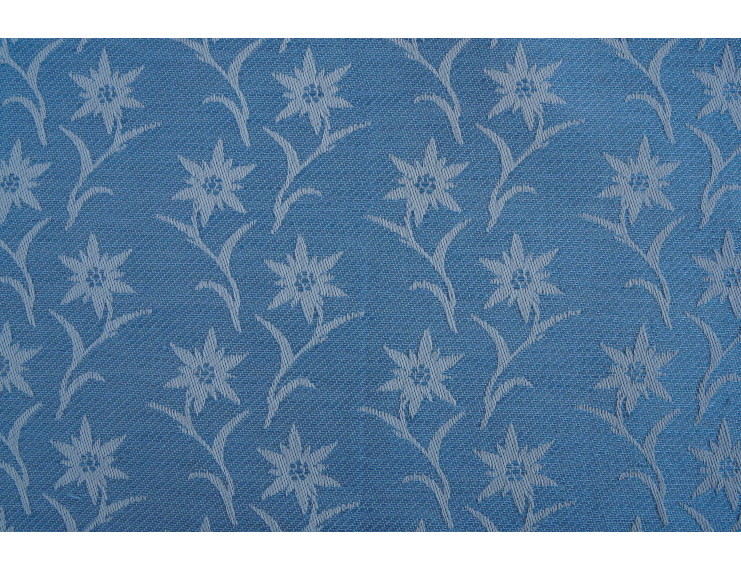 Tessuto jacquard celeste in misto cotone e lino con edelweiss